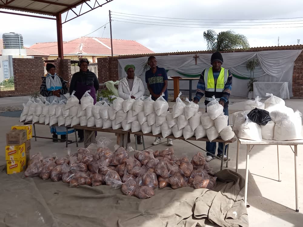 Volunteers packing food parcels